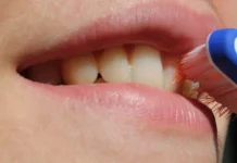 How to Instill Healthy Dental Habits in Children A cheerful family in a bright bathroom emphasizing Healthy Dental Habits