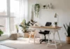A serene and stylish minimalist modern home office featuring natural light, neutral colors, and ergonomic furniture.