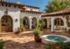 A vibrant Spanish Mediterranean Homes-style featuring a white stucco exterior