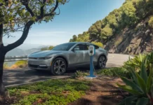 scenic mountain road with a portable electric car charger connected