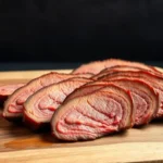 Fermented High Meat: Benefits, Risks & How to Make It A rustic wooden cutting board with Fermented High Meat