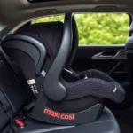 Maxi Cosi Infant Car Seat Base: Safety Meets Style Maxi Cosi Infant Car Seat Base installed in a modern car