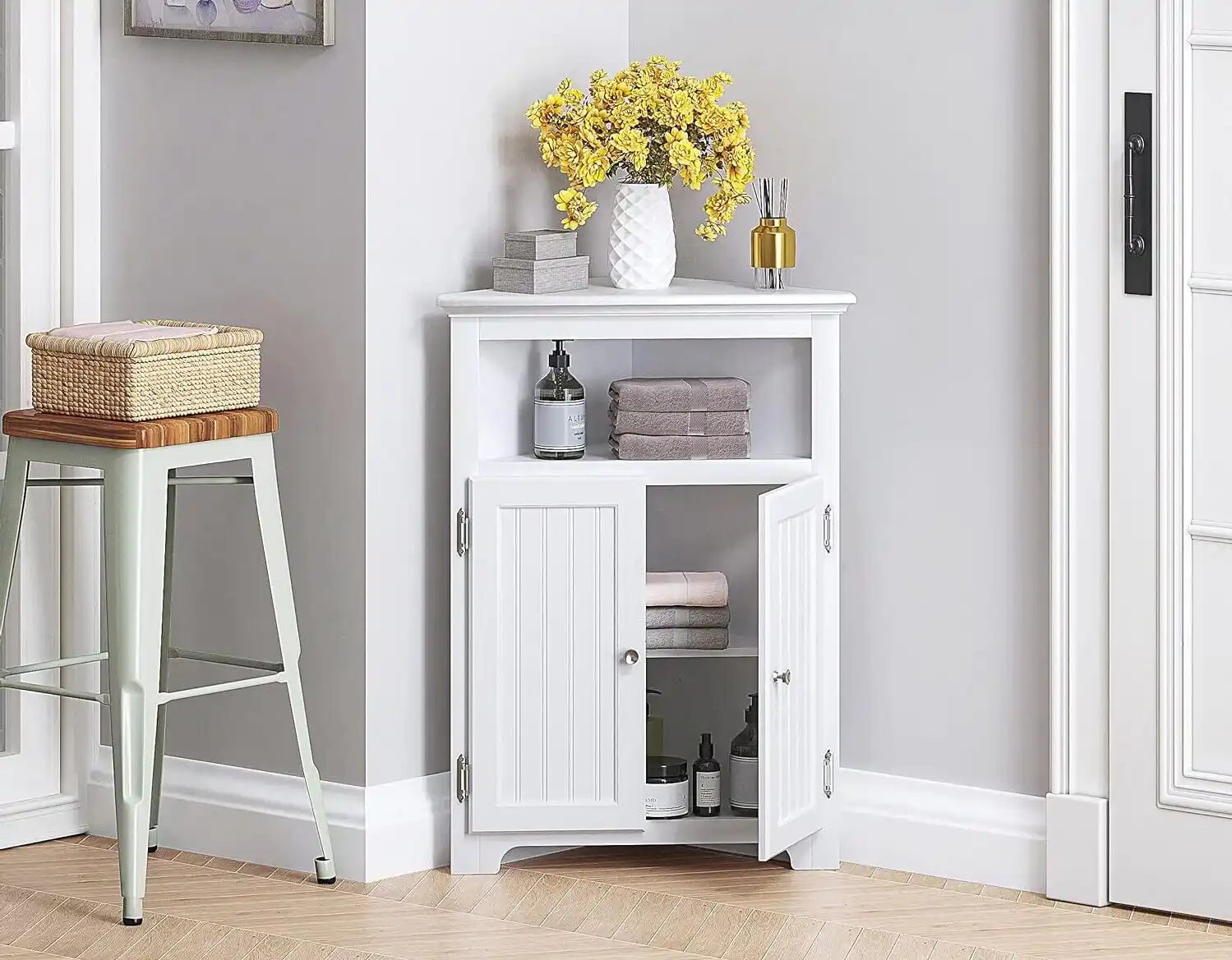 A stylish and modern small corner cabinet in a cozy living room. A stylish and modern small corner cabinet