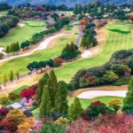 A scenic wide-angle shot of a pristine golf course during golden hour