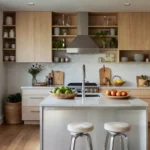 Practical Advice On Space Planning for Small Kitchen A stylish, modern small kitchen with tall white cabinets