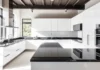 Granite Worktop Kitchen – Styles, Cost & Benefits Guide A modern kitchen with sleek black granite worktops
