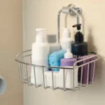Modern bathroom with a neatly organized chrome shower caddy hanging in the corner