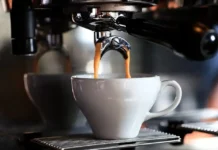 The best coffee machine brewing fresh coffee in a cozy kitchen setting