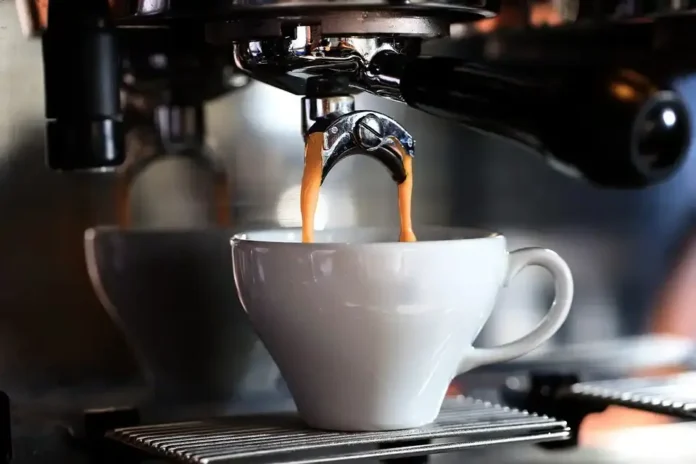 The best coffee machine brewing fresh coffee in a cozy kitchen setting