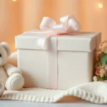 A beautifully wrapped baby shower gift box with neutral pastel colors