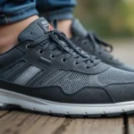 Close-up of a stylish Sneakers for Plantar Fasciitis on a wooden floor