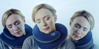 image of a traveler comfortably resting on a BCOZZY travel neck pillow