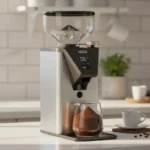A sleek Gaggia grinder on a modern kitchen countertop