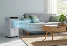 living room interior with a sleek Vissani evaporative air cooler beside a cozy sofa