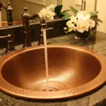 luxury kitchen featuring a hammered copper sink
