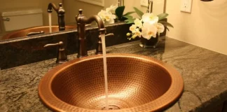 luxury kitchen featuring a hammered copper sink