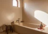 Elegant bathroom with smooth waterproof tadelakt plaster walls