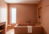 Elegant tadelakt bathroom with polished Moroccan lime plaster walls