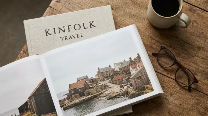 Kinfolk travel guide featuring a stylish traveler exploring a peaceful countryside with minimalist slow travel elegance.