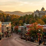 Best Photo Spots in Eureka Springs featuring historic downtown, Crescent Hotel, Thorncrown Chapel, and scenic Ozark Mountain views at sunset.