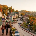 Getaway Ozarks Eureka Springs: Complete Travel Guide Historic downtown Eureka Springs in the Ozark Mountains featuring Victorian buildings, colorful fall foliage, and scenic hillside streets for an unforgettable Ozarks getaway.