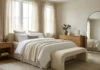 Quiet Luxury Bedroom Ideas Under $500 (15 Elegant Upgrades) Quiet luxury bedroom ideas featuring neutral décor, layered bedding, natural textures, and elegant furniture under a $500 budget.