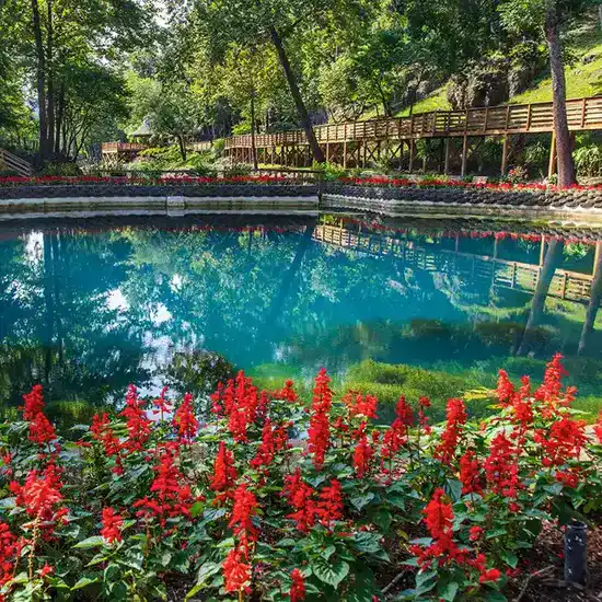 Blue Spring and its clear lagoon surrounded by the Ozark landscape near Eureka Springs, Arkansas