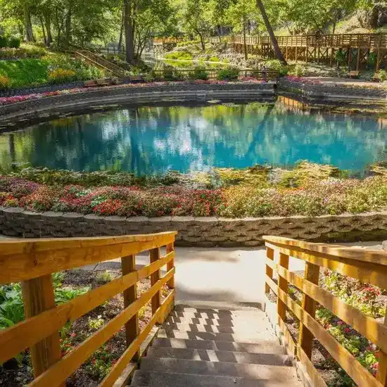 Lush gardens and natural scenery at Blue Spring Heritage Center near Eureka Springs, Arkansas