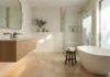 Japandi bathroom design with natural oak vanity, stone surfaces, warm lighting, and spa-like luxury