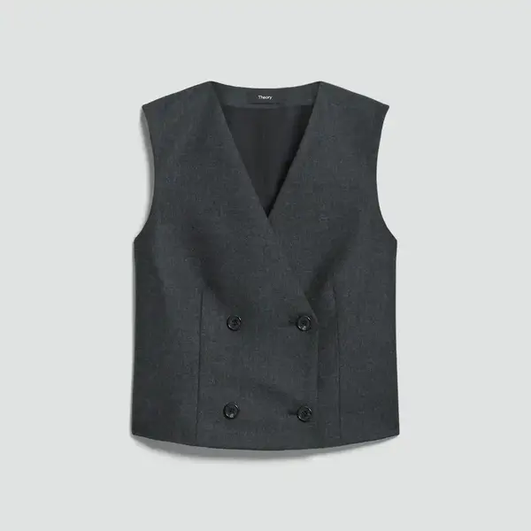 Tailored wool vest for layering over a button-down shirt or beneath a blazer.