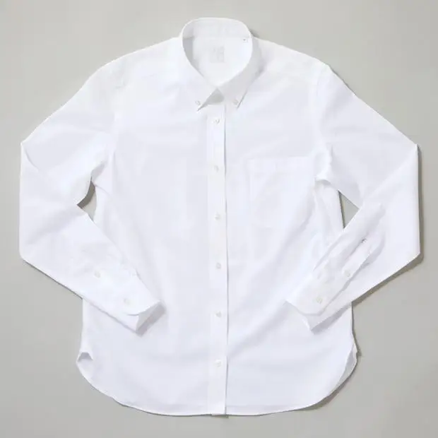 Classic white Oxford button-down shirt for elegant old money winter outfits.