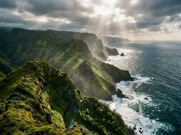 Green cliffs and deep valleys along Kauai's dramatic Nā Pali Coast.